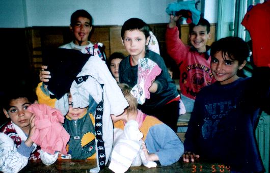Romanian orphans in hospital with gifts